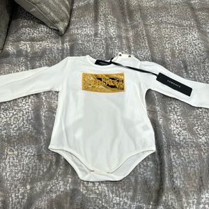 Versace bodysuit size 12m to 18 months. Boys or girls.